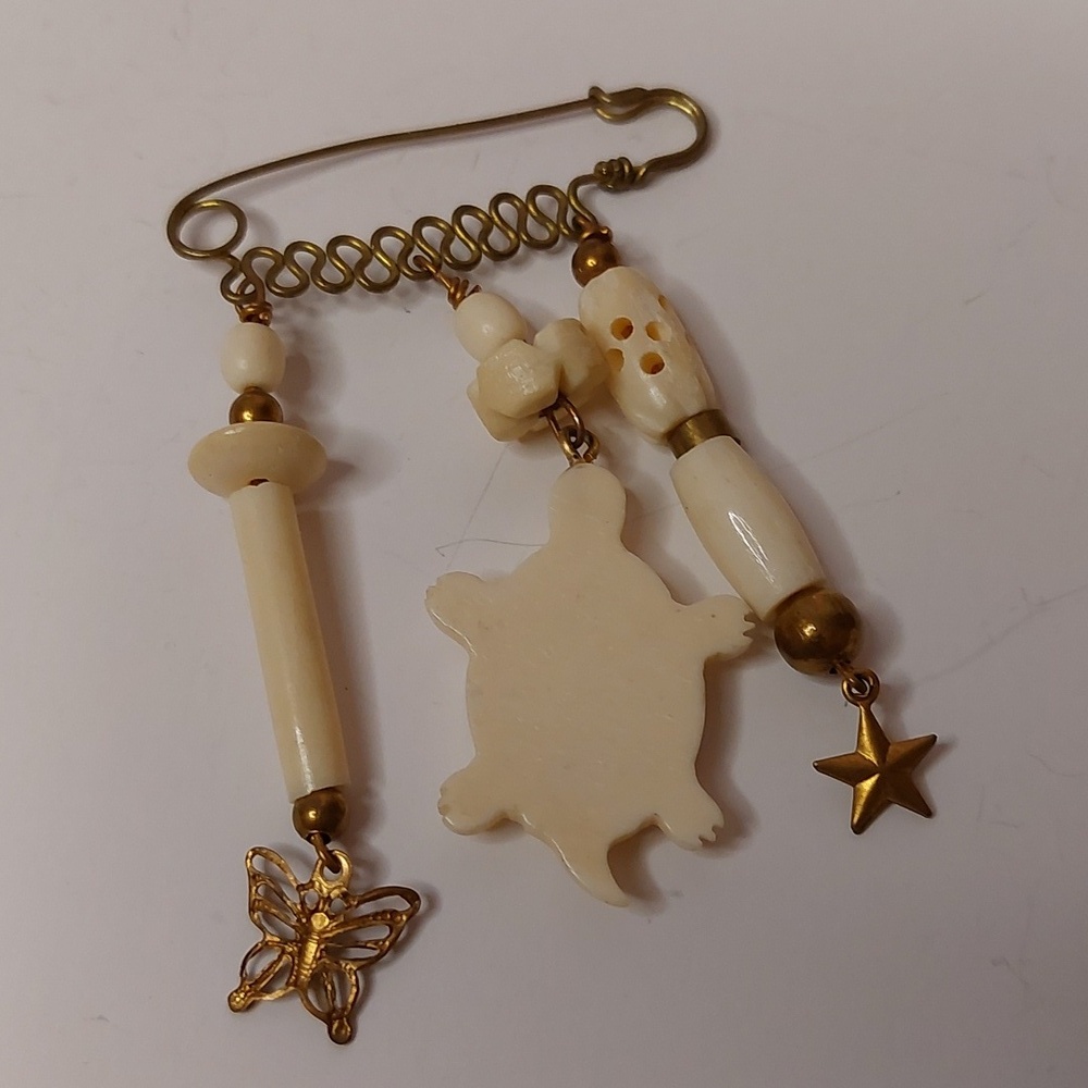 Vintage Carved Bone and Brass Dangling Charms Brooch Pin - Picture 4 of 6